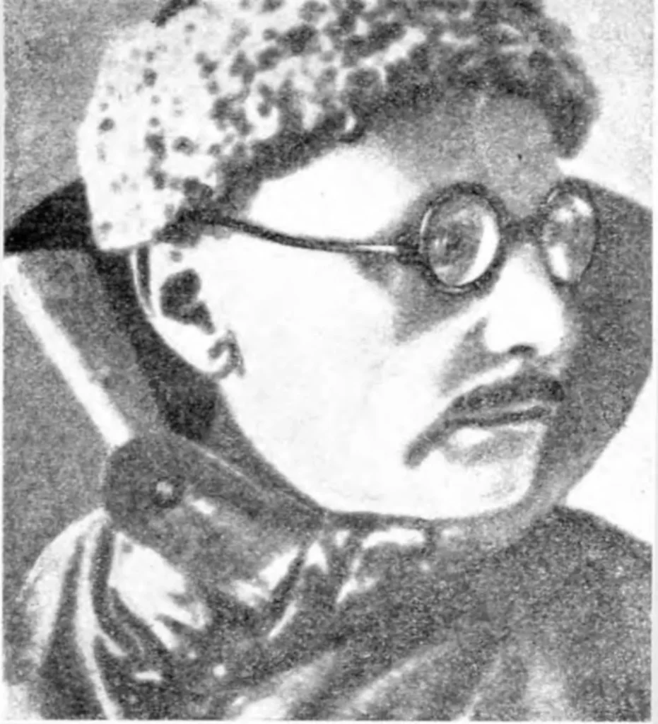 Леонид Кулик в меховой шапке и очках, портрет из журнала Мироведение 1928 года